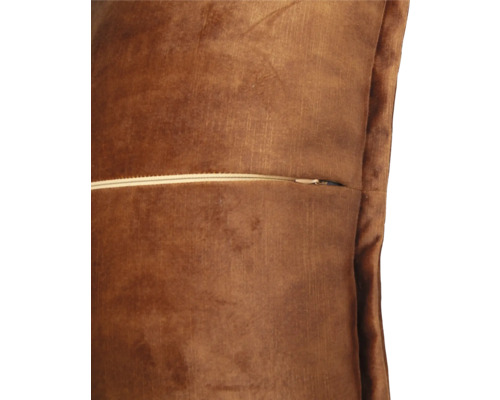 Vue détaillée d''un coussin décoratif marron avec fermeture éclair