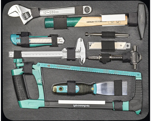 Werkzeugsortiment mit Schraubenschlüssel, Hammer, Messerschneider, Messschieber, Säge und Spachtel