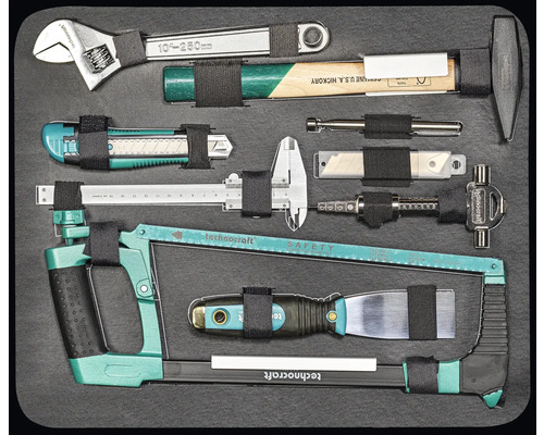 Werkzeugsortiment mit Schraubenschlüssel, Hammer, Cutter, Messschieber, Metallsäge und Spachtel
