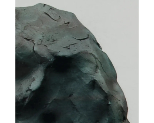 Gros plan d''une sculpture à la surface rugueuse