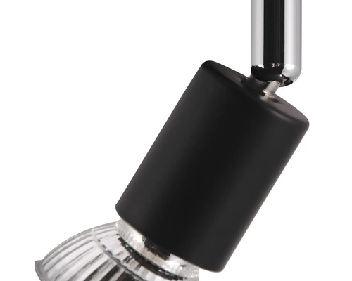 Détail d''un spot noir avec abat-jour argenté.