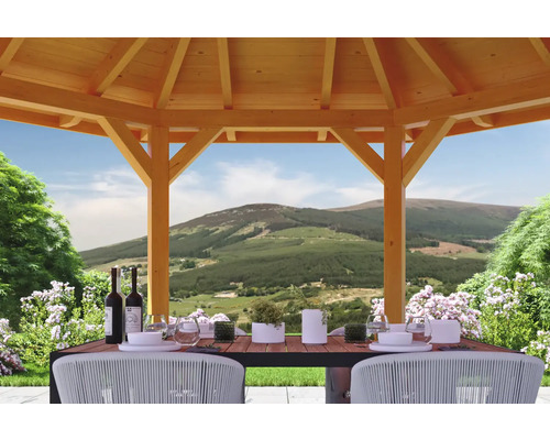 Pavillon en bois avec table à manger et paysage de montagne en arrière-plan