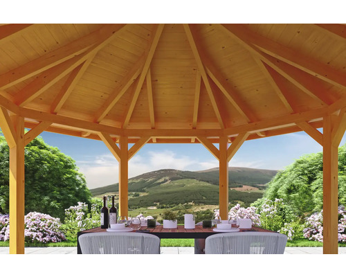 Pavillon de jardin en bois avec table et chaises.