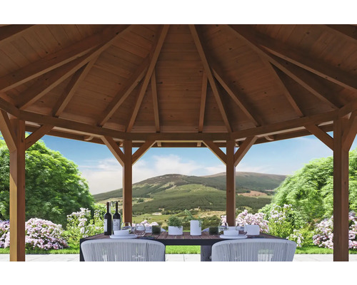 Holzpavillon mit Esstisch und Blick auf die Landschaft