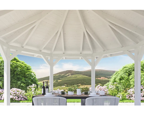 Weisser Pavillon mit Esstisch und Ausblick in die Natur