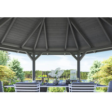 Pavillon de jardin en bois avec table à manger et vue sur le jardin