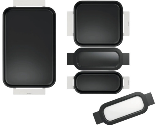 Raclette avec plusieurs poêlons et plaques de gril