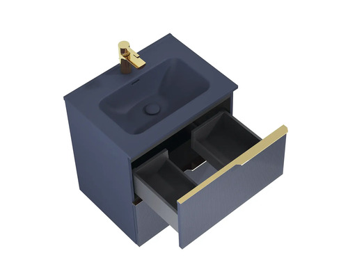 Meuble sous-vasque avec tiroir ouvert et robinetterie dorée