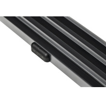 Gros plan d''un radiateur en aluminium avec des ailettes et un capuchon en plastique