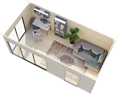 Vue intérieure d''un chalet de jardin avec bureau, bibliothèque et canapé.
