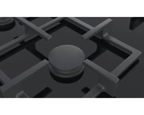 Vue détaillée d''une cuisinière à gaz avec support de casserole