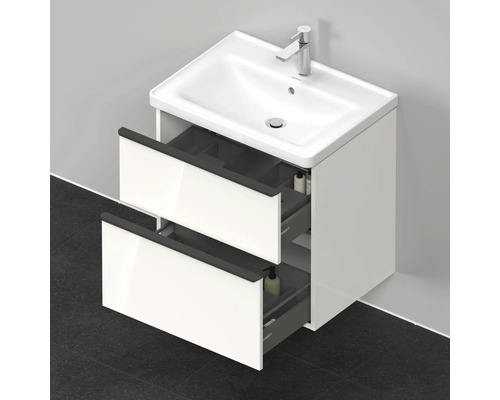 Meuble sous-vasque avec deux tiroirs ouverts et un lavabo