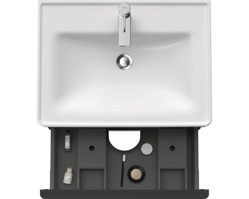 Meuble-lavabo avec tiroir ouvert pour ranger les accessoires de salle de bain