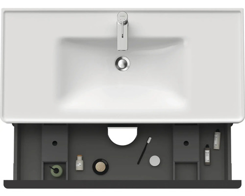 Meuble-lavabo avec robinet et meuble bas ouvert pour ranger les accessoires de salle de bain