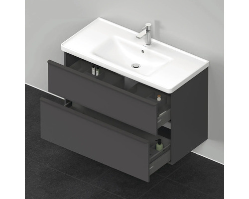 Meuble-lavabo avec deux tiroirs ouverts et lavabo à poser