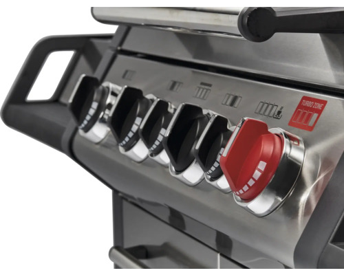 Gros plan d''un barbecue à gaz avec des boutons rotatifs pour régler la chaleur