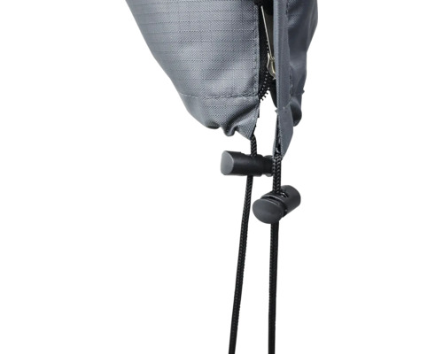 Gros plan d''une bâche avec fermeture éclair et cordon de serrage.