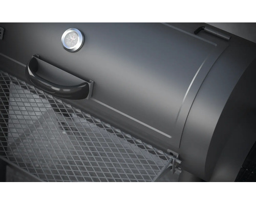 Gros plan d''un barbecue au charbon de bois avec thermomètre et grille