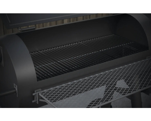 Vue intérieure d''un gril ouvert avec grille et étagère de rangement