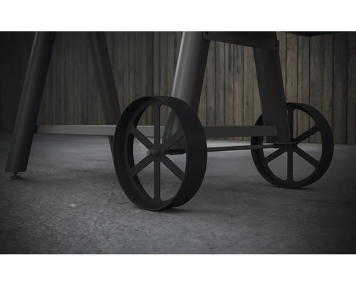 Gros plan sur les roues d''un chariot de grill pour faciliter le transport