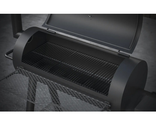 Gril à charbon de bois ouvert avec grille de cuisson