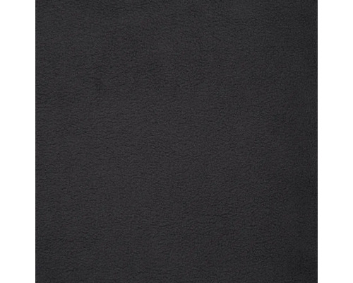 Gros plan d''une surface d''enduit noire.