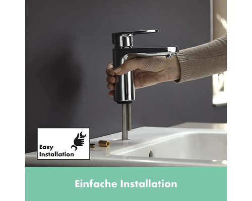 Installation d''un robinet sur un lavabo