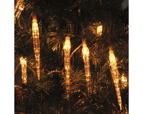 Guirlande lumineuse avec glaçons sur un sapin de Noël