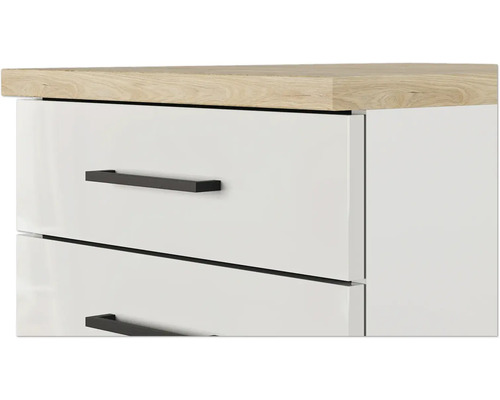 Gros plan d''un meuble blanc avec tiroirs et plateau en bois marron clair