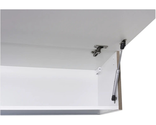 Vue détaillée d''une armoire ouverte avec charnière et vérin à gaz