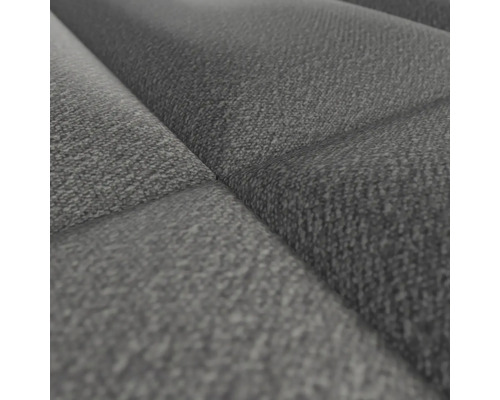 Nahaufnahme eines grauen, gesteppten Stoffbezugs