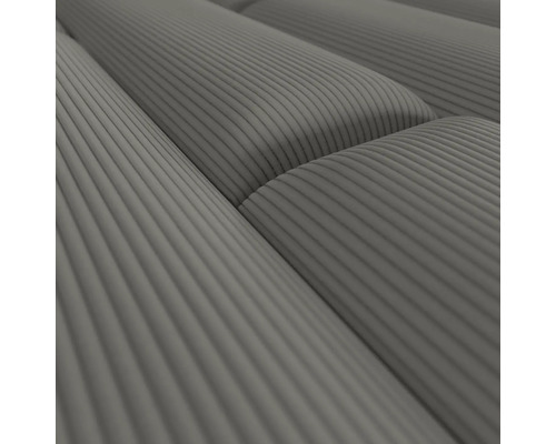 Gros plan sur des coussins décoratifs côtelés