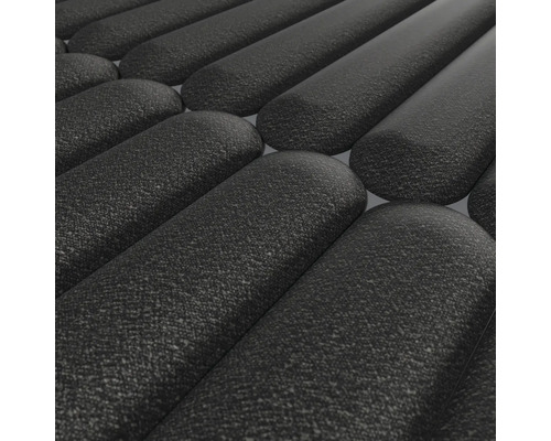 Gros plan d''un paillasson noir avec un profil côtelé