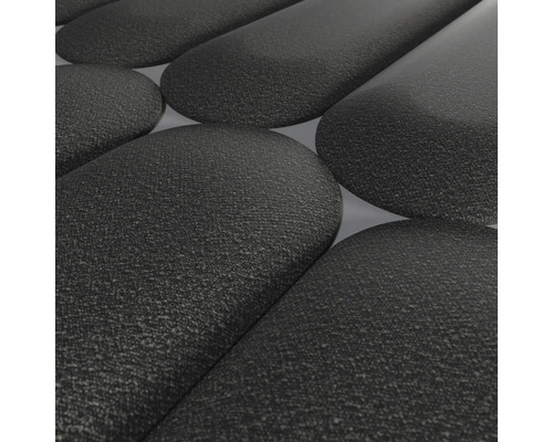 Gros plan de pavés noirs texturés