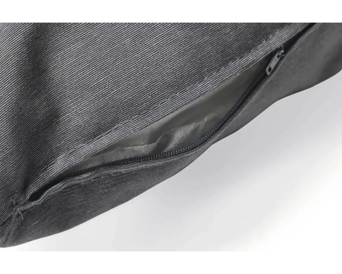 Gros plan d''une housse de coussin décorative grise avec fermeture éclair