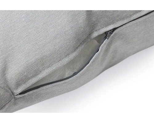 Gros plan d''un coussin avec fermeture éclair