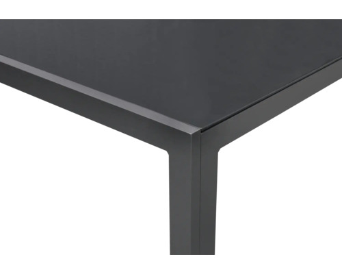 Vue détaillée d''un plateau de table avec cadre et pied en métal