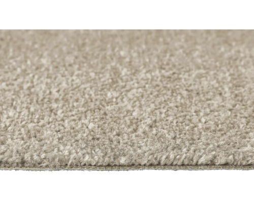 Nahaufnahme eines beigen Teppichs