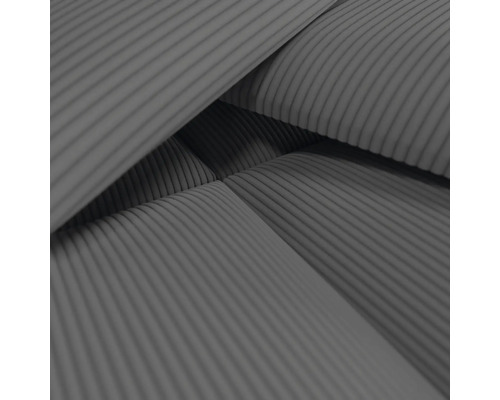 Gros plan d''un revêtement de meuble avec motif côtelé