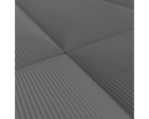 Gros plan d''un matelas gris côtelé