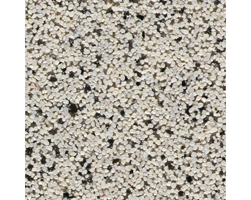 Nahaufnahme einer Oberfläche mit kleinen weißen und schwarzen Kieselsteinen.