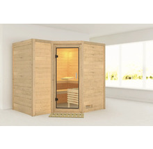 Sauna en bois avec porte en verre et aménagement intérieur dans une pièce claire