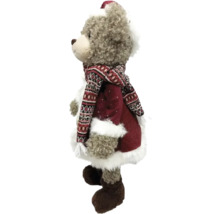 Ours en peluche avec manteau et écharpe comme décoration