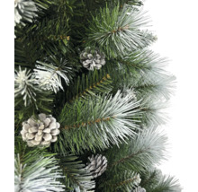 Gros plan d''un arbre de Noël artificiel avec des pommes de pin