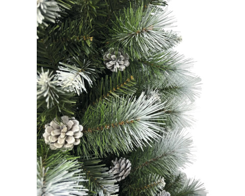 Gros plan d''un arbre de Noël artificiel avec des pommes de pin