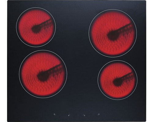 Plaque de cuisson noire avec quatre plaques chauffantes en fonctionnement