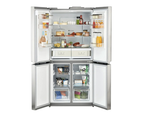 Réfrigérateur-congélateur ouvert rempli de provisions