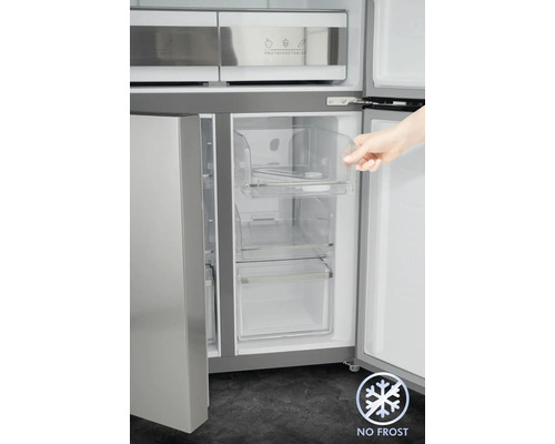 Réfrigérateur ouvert avec tiroirs transparents et symbole No Frost