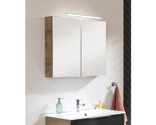 Armoire suspendue à miroir avec éclairage au-dessus du lavabo