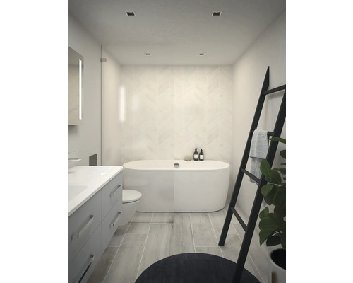 Salle de bains lumineuse avec baignoire, meuble-lavabo et étagère échelle